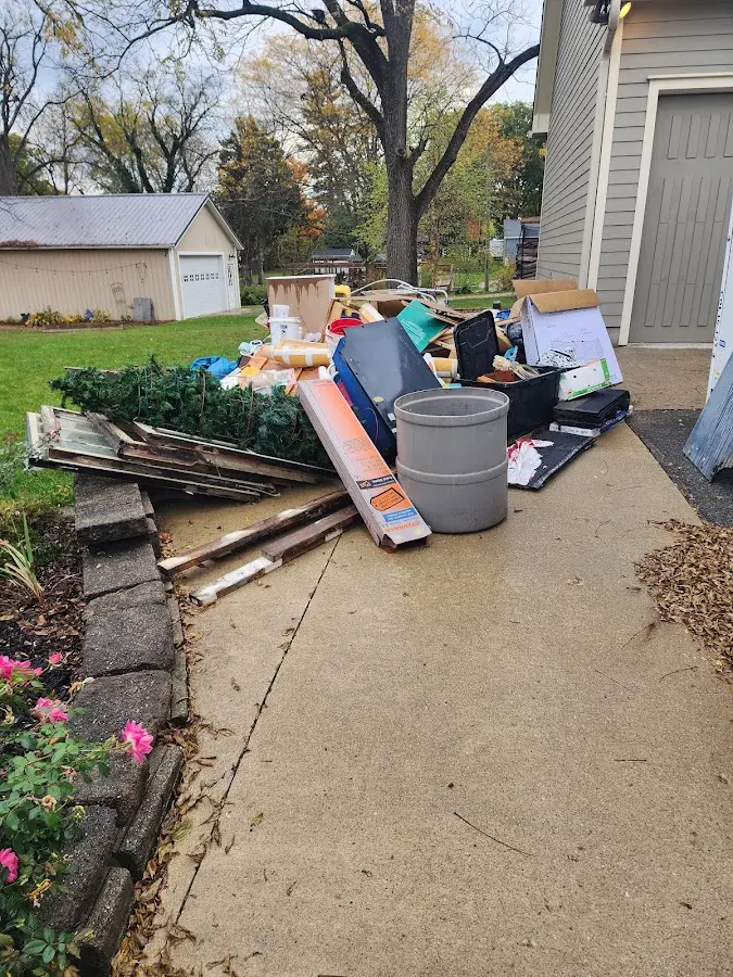 Dumpster being loaded with debris for 30 Yard Dumpster Rental in Washougal